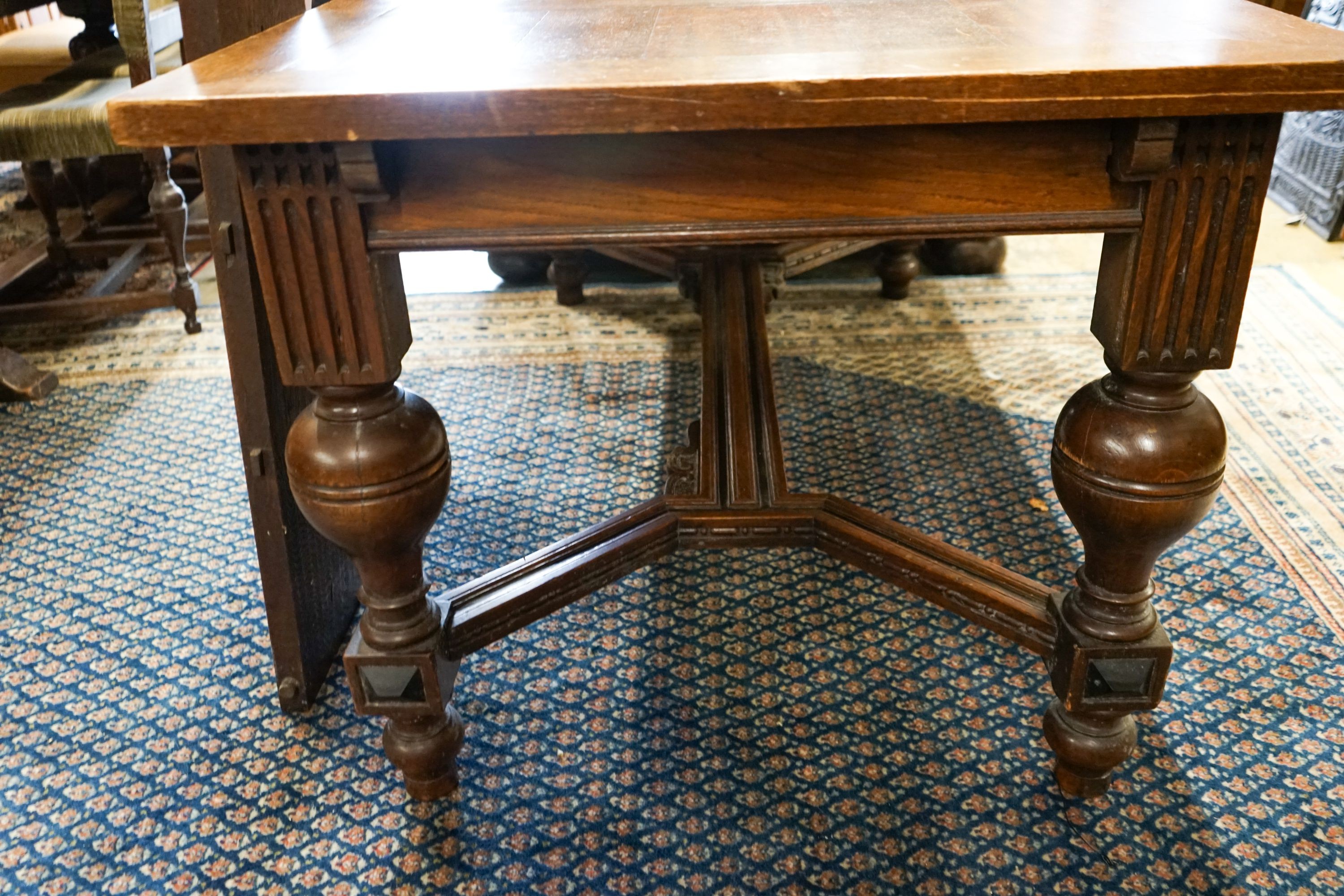A 19th century Dutch rectangular oak extending dining table, 220cm extended, width 94cm, height 76cm on four carved bulbous supports (two additional leaves) and a set of five dining chairs